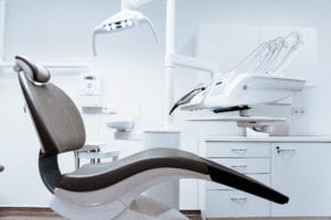 A dentist chair can evoke feelings of anxiety in those who suffer from dental fear and avoidance issues. 
