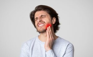 tooth pain can often be considered a dental emergency at christmas