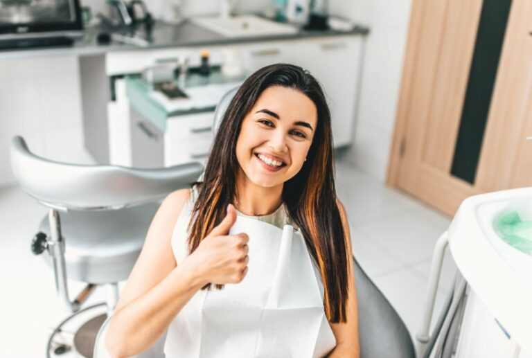 What is sedation dentistry? Patient giving the thumbs up.